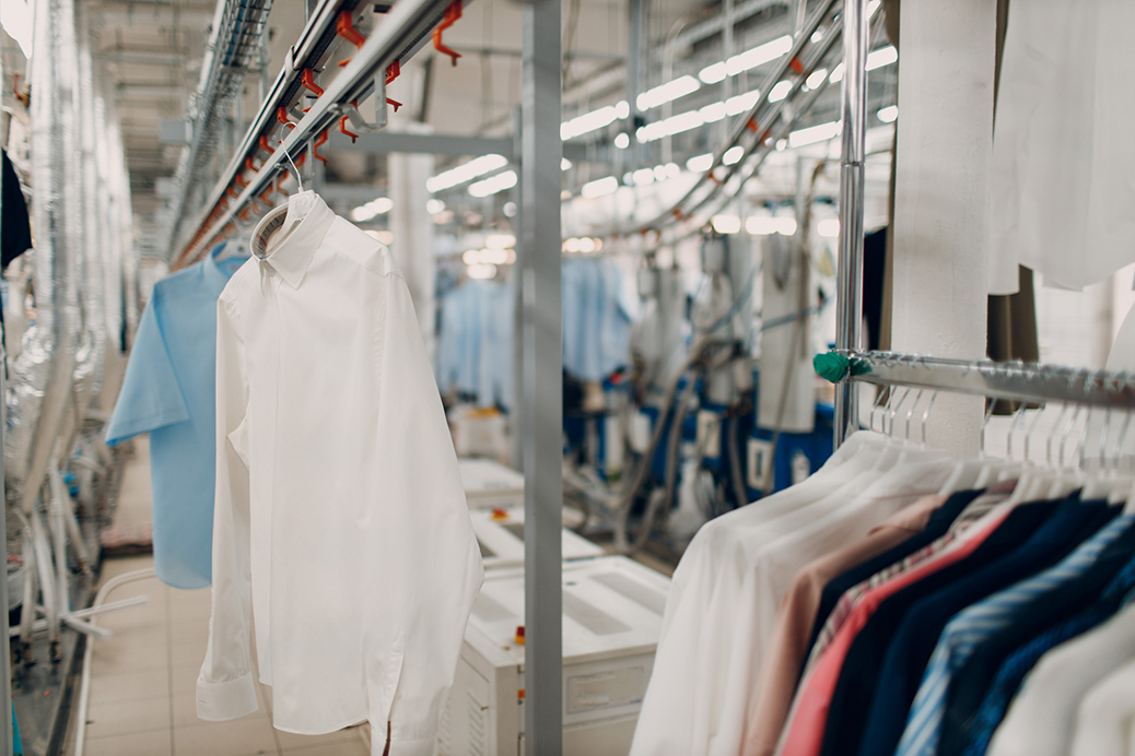 Dry Cleaning Clothes. Clean Cloth Chemical Process. Laundry Industrial Dry cleaning